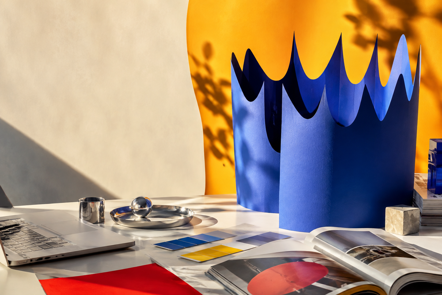 Abstract blue paper crown in a creative studio